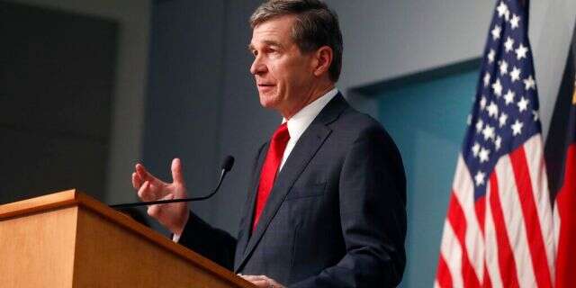 North Carolina Gov. Roy Cooper speaking in Raleigh on Tuesday. (Ethan Hyman/The News & Observer via AP)